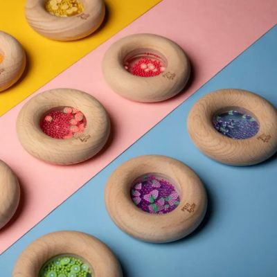 Hochet sensoriel Sensory Donut aubergines